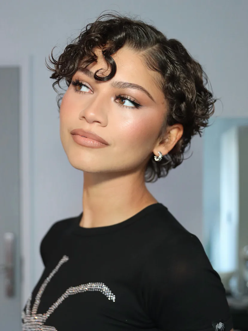 Zendaya with a springy curl cut hairstyle