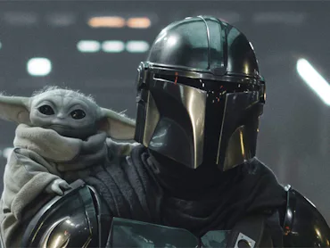 Grogu and Din Djarin (Pedro Pascal) in The Mandalorian and Grogu