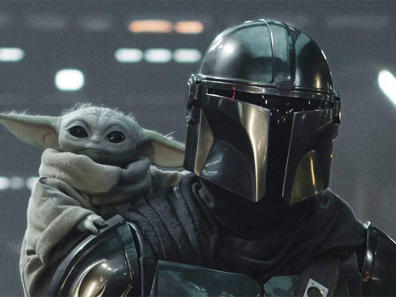 Grogu and Din Djarin (Pedro Pascal) in The Mandalorian and Grogu