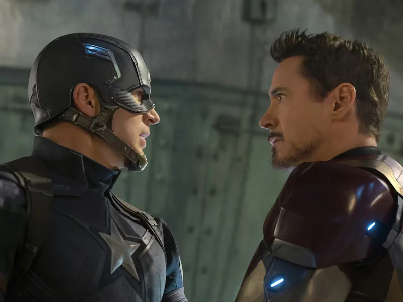 Steve Rogers/Captain America (Chris Evans) and Tony Stark/Iron Man (Robert Downey Jr.) in Captain Am...