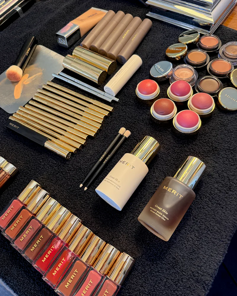 Flat lay of Merit Beauty products used on Misty Copeland