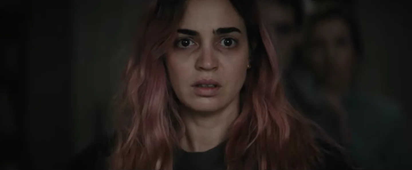 Souheila Yacoub watches some f-ed up stuff happen in the Evil Dead Burn trailer. 