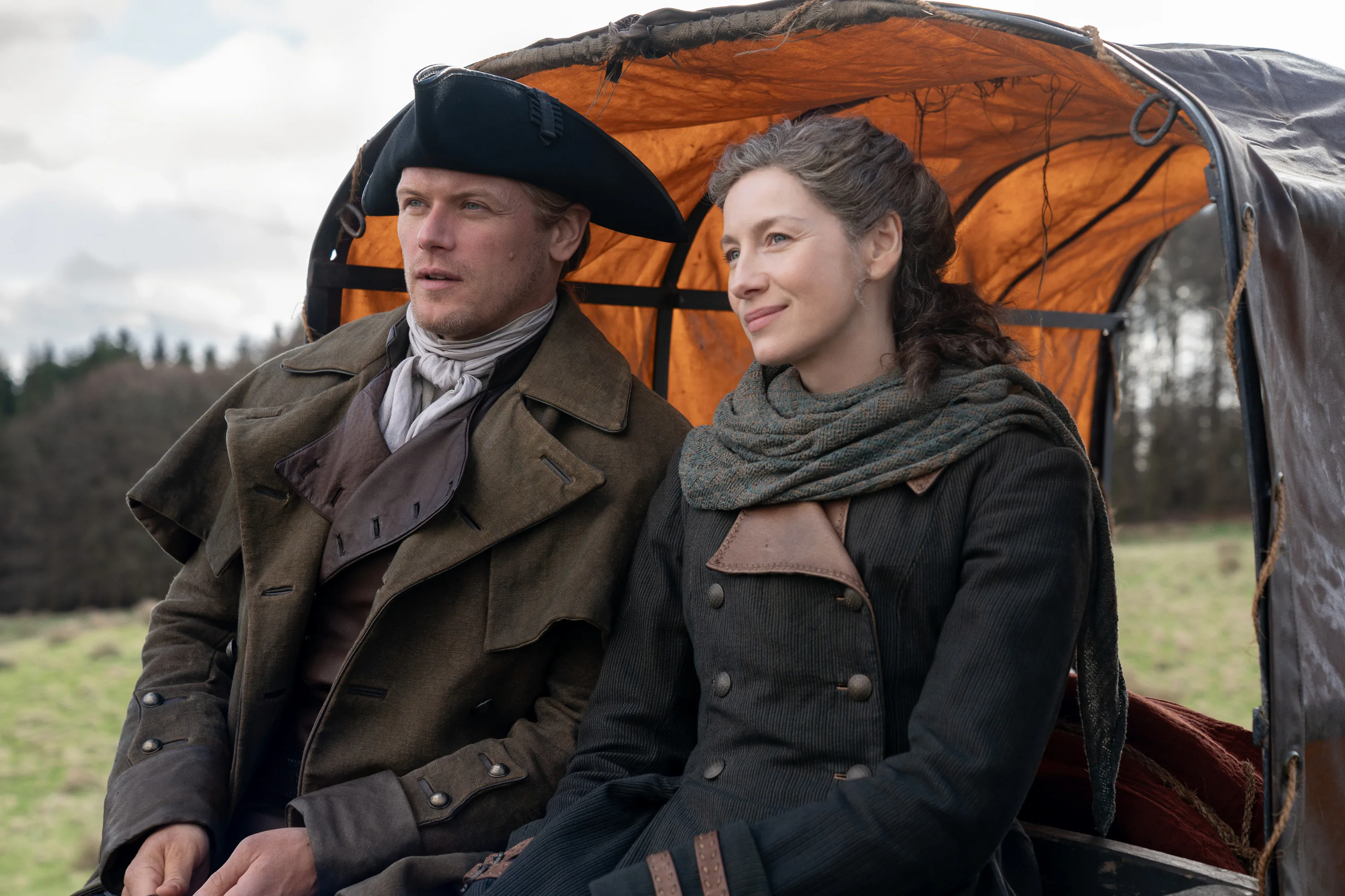 Sam Heughan and Caitríona Balfe as Jamie and Claire in Outlander. Photo via Starz