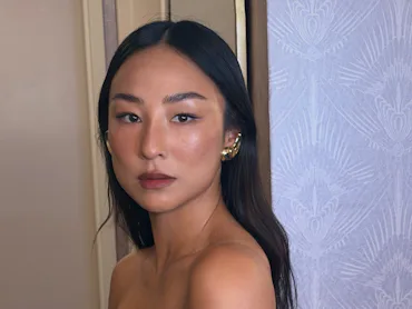 Greta Lee with long hair