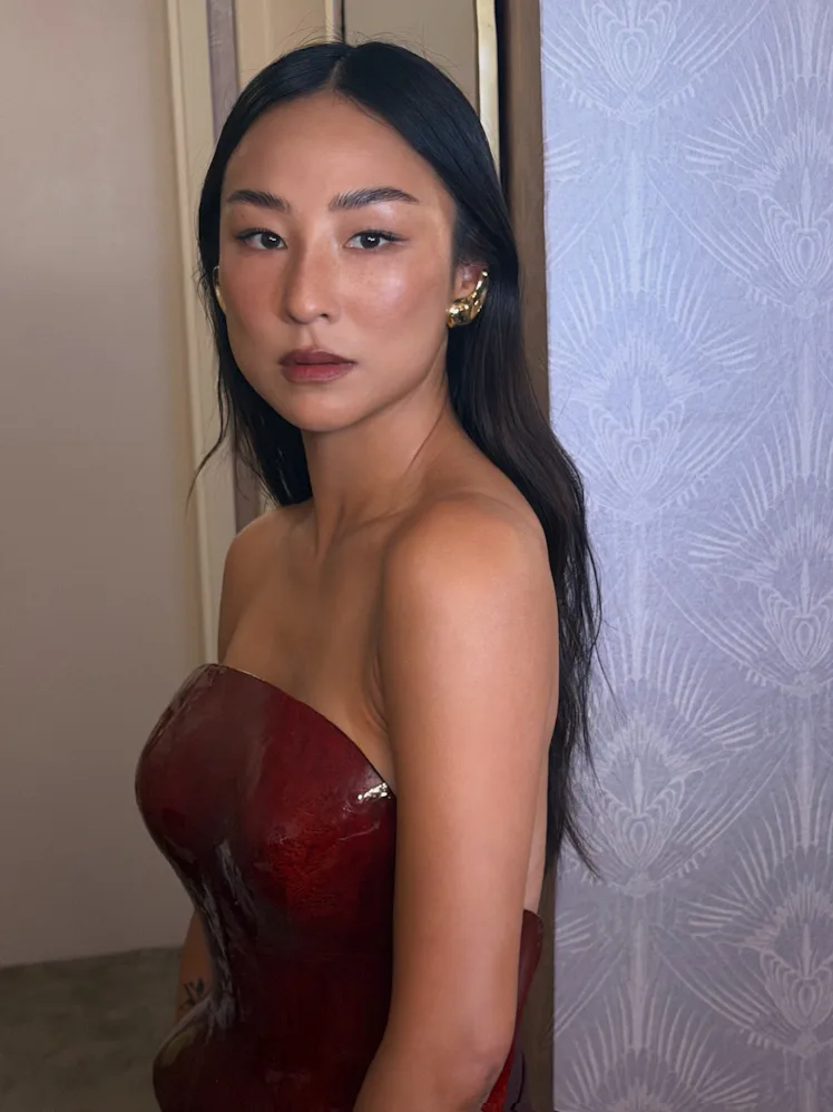 Greta Lee with long hair