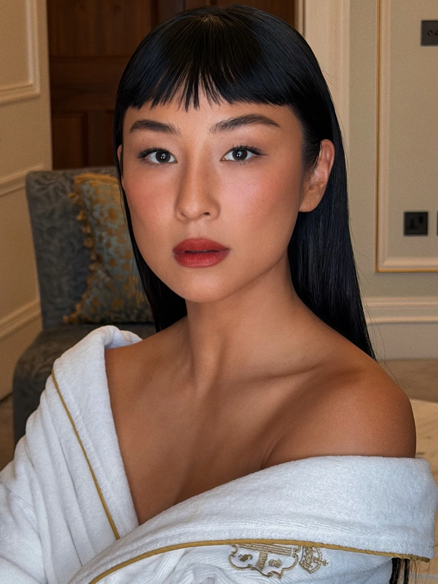 Greta Lee with micro bangs