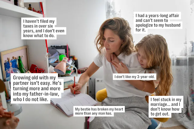 Woman sitting at a cluttered desk, writing in a notebook while a young child sits on her lap; speech...