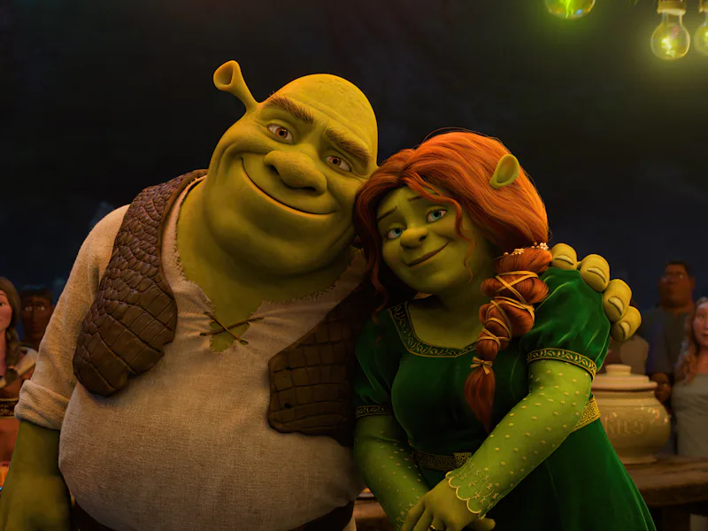 Shrek (Mike Myers) embraces Fiona (Cameron Diaz) in Shrek 5