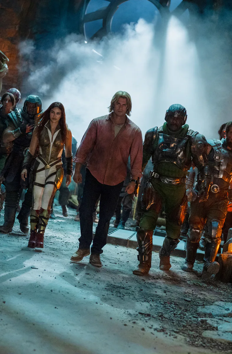 Camila Mendes, Nicholas Galitzine, Idris Elba, and Jóhannes Haukur Jóhannesson in Masters of the Uni...