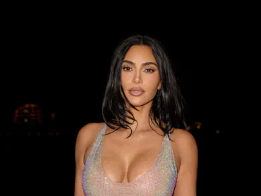 Kim Kardashian in a sparkling stretchy dress