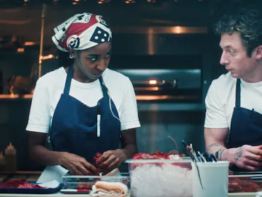 Ayo Edebiri and Jeremy Allen White as Sydney and Carmy on The Bear. Photo via FX