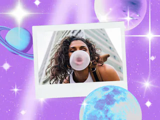 Young woman blowing a bubble before reading her July 2026 horoscope.