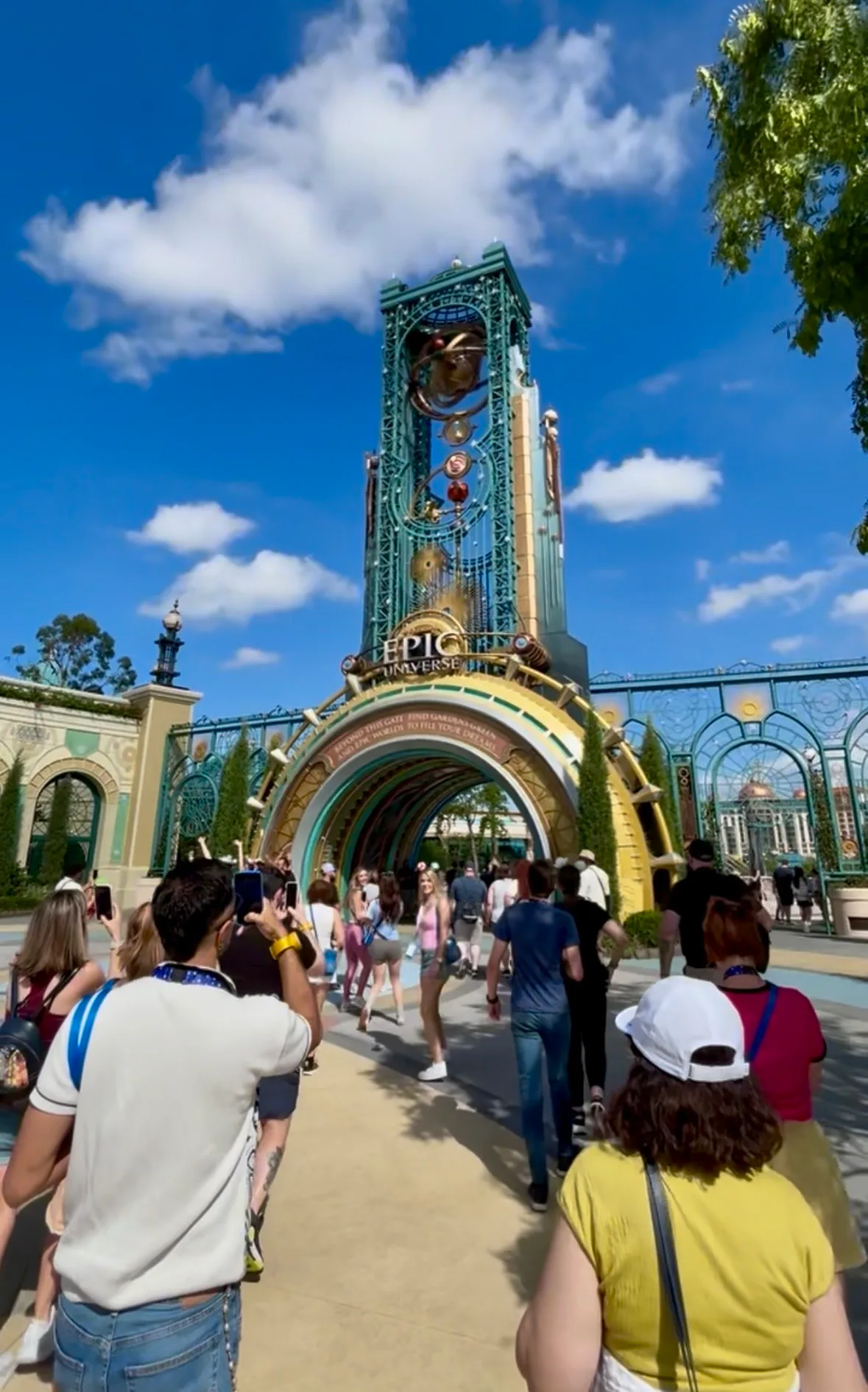 A crowd walking into the entrance of Epic Universe, in a story about what to know before your first ...