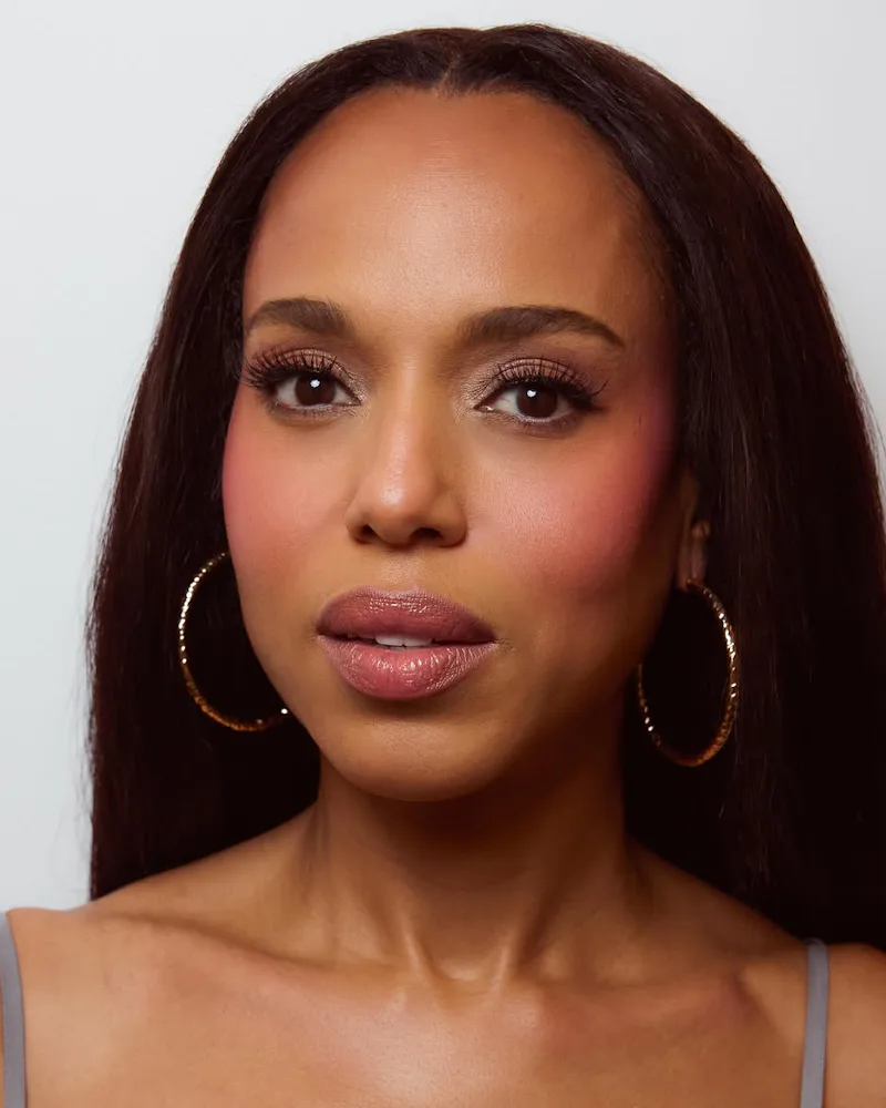 Kerry Washington wearing bright pink blush with straight hair