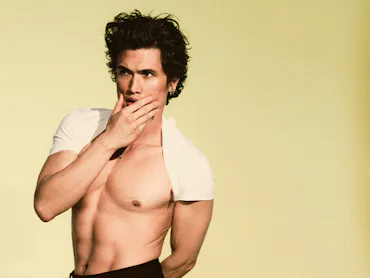 Charles Melton shirtless in black pants