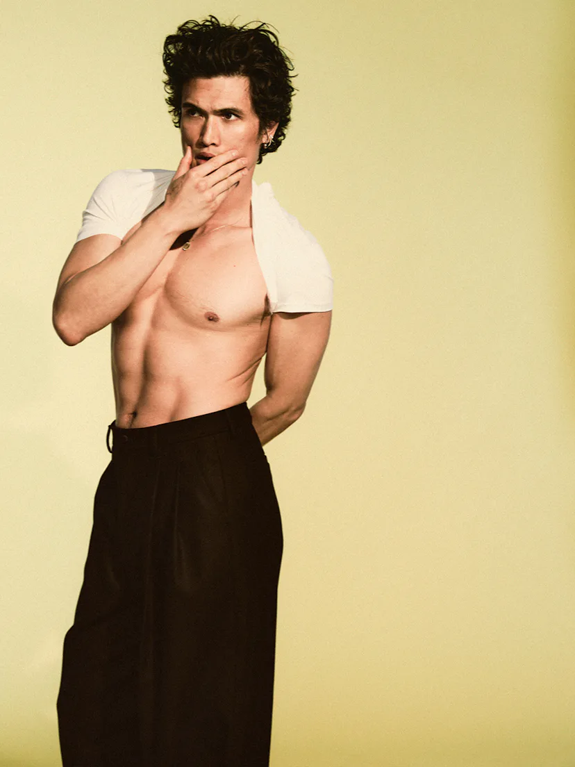 Charles Melton shirtless in black pants