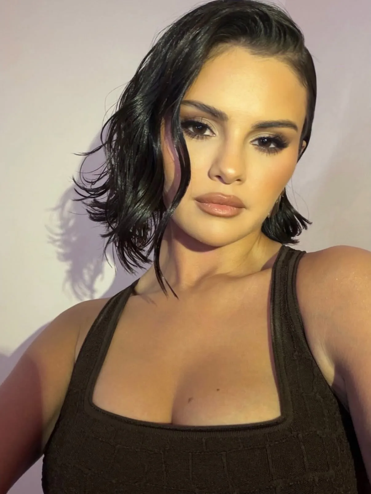 Selena Gomez with a wet-look hairstyle
