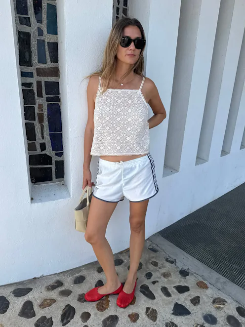 Anne-Laure Mais in track shorts