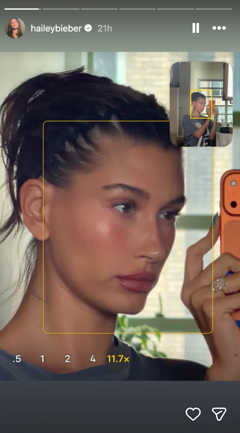 Hailey Bieber wearing a zig-zag headband in a selfie