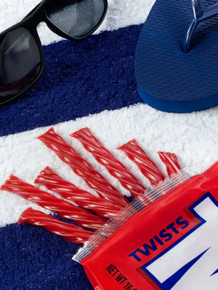 Twizzlers on a beach towel