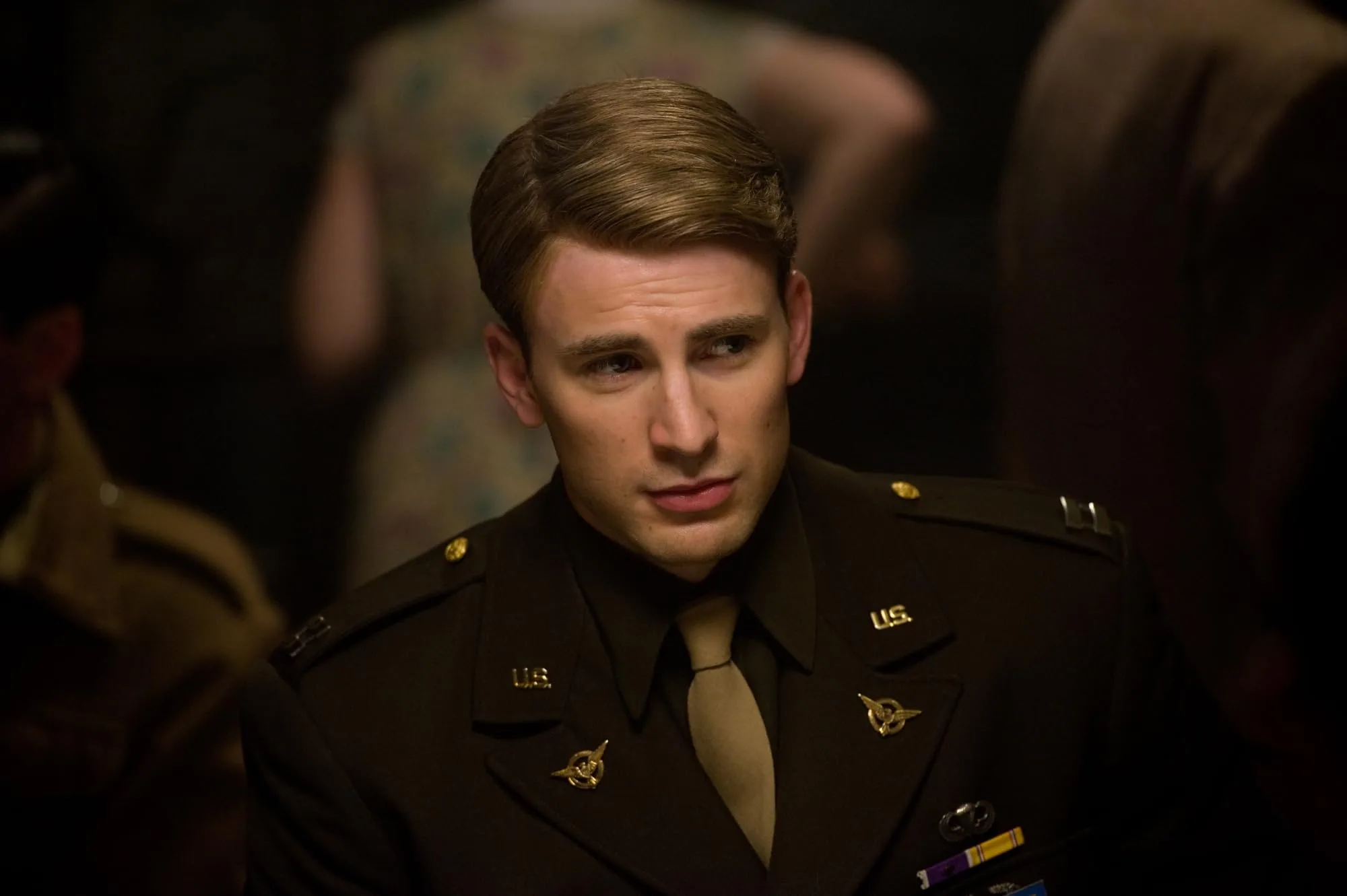 Chris Evans as Captain America/Steve Rogers in Captain America: The First Avenger
