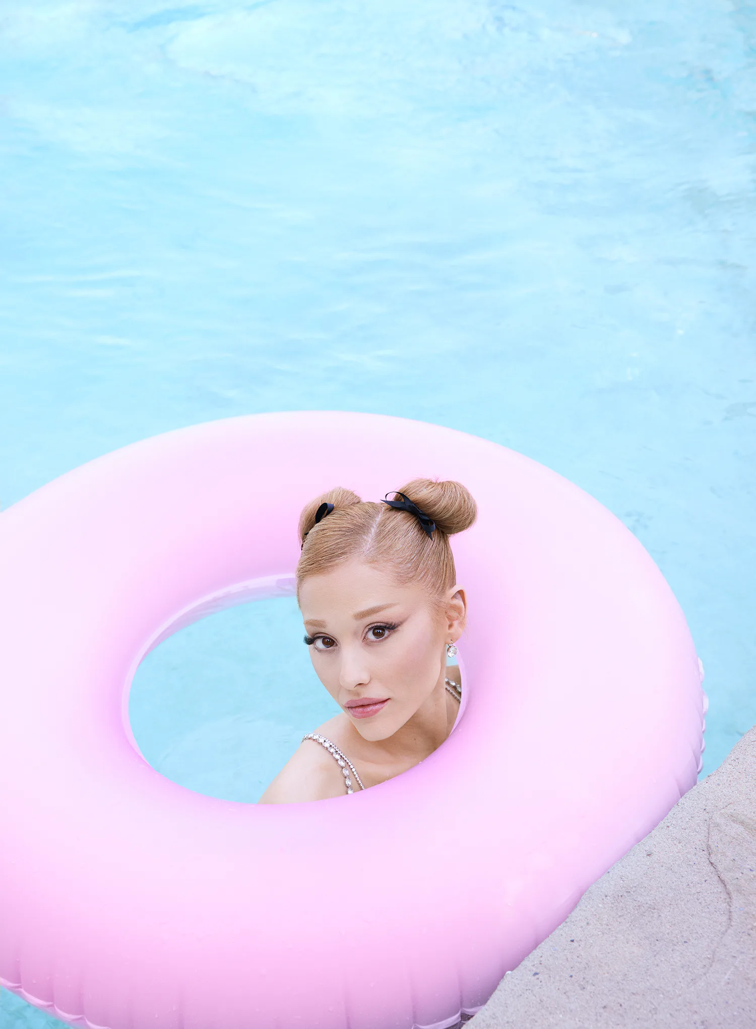 ariana grande in a pool