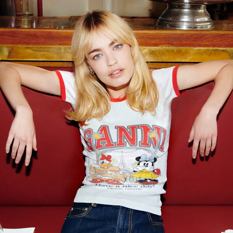 A girl wearing a shirt from GANNI x Disney's third and final Daisy Duck collaboration.