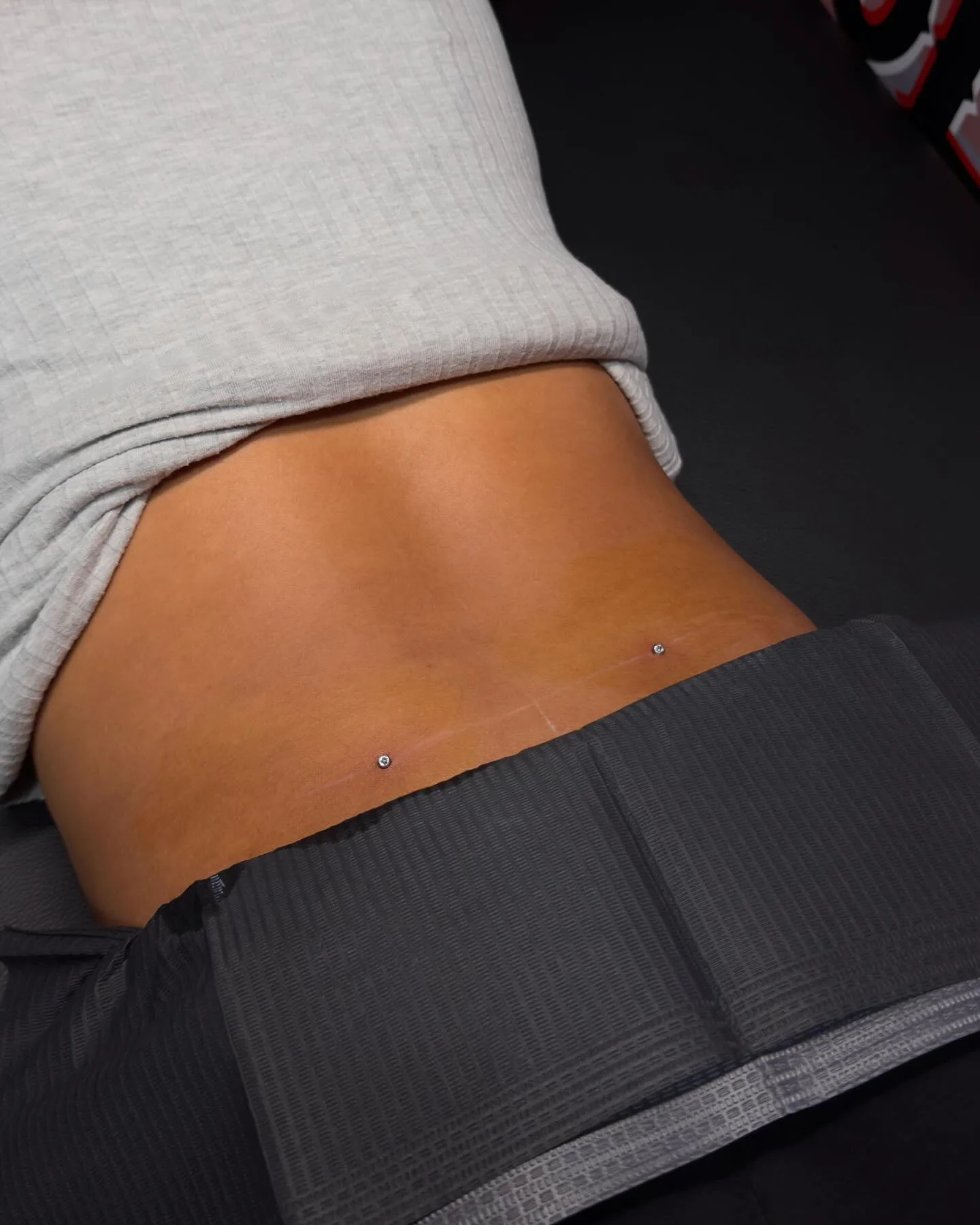 back dimples piercing
