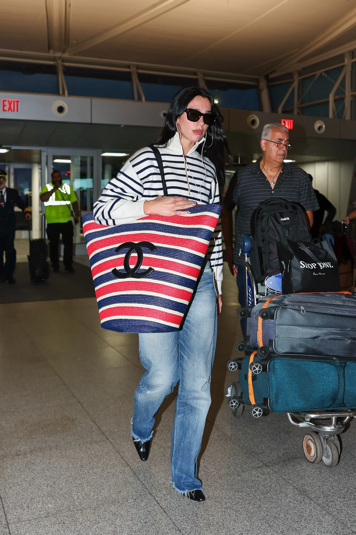 Dua Lipa’s Giant Chanel Basket Bag Tests the Limits of Carry-On Luggage