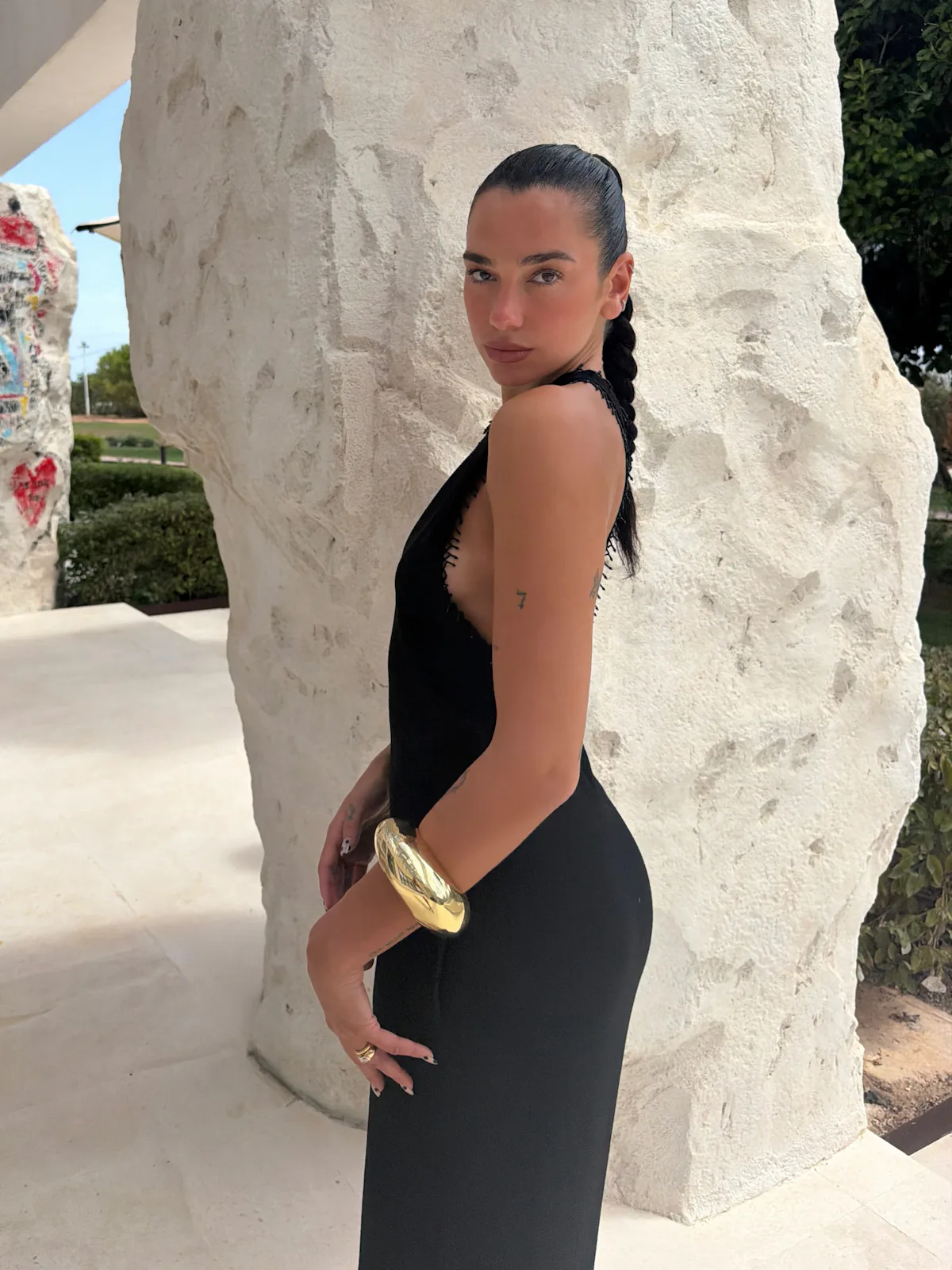 For her Birthday in Ibiza, Dua Lipa Puts a Textural Twist on the LBD