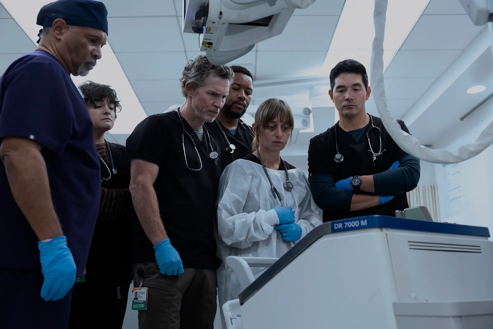 Geoffrey Owens, Cheyenne Perez, Shawn Hatosy, Luke Tennie, Sofia Hasmik, and Ken Kirby on The Pitt. ...