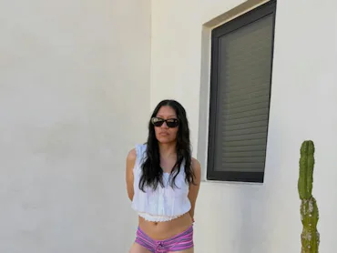 Daniela Guevara in swim shorts