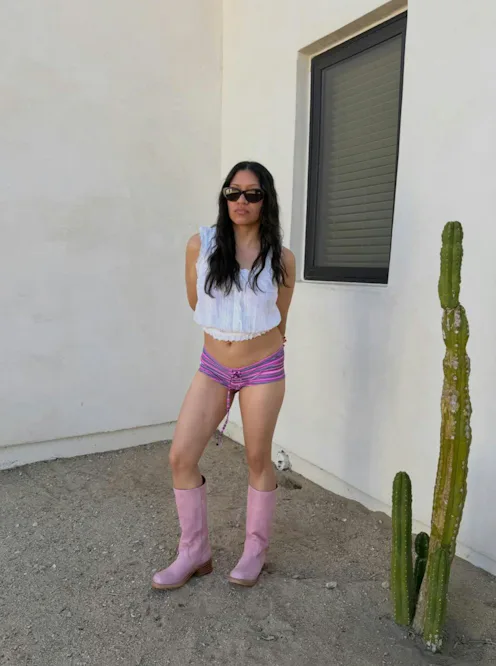 Daniela Guevara in swim shorts