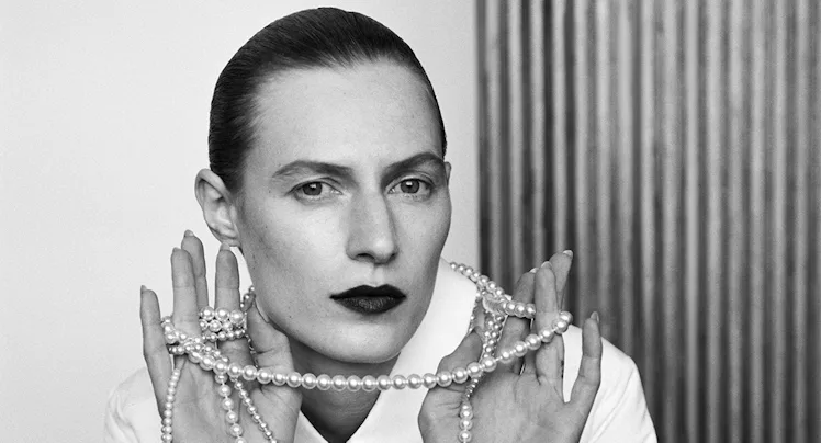 Black and white picture of Julia Nobis wearing pearls