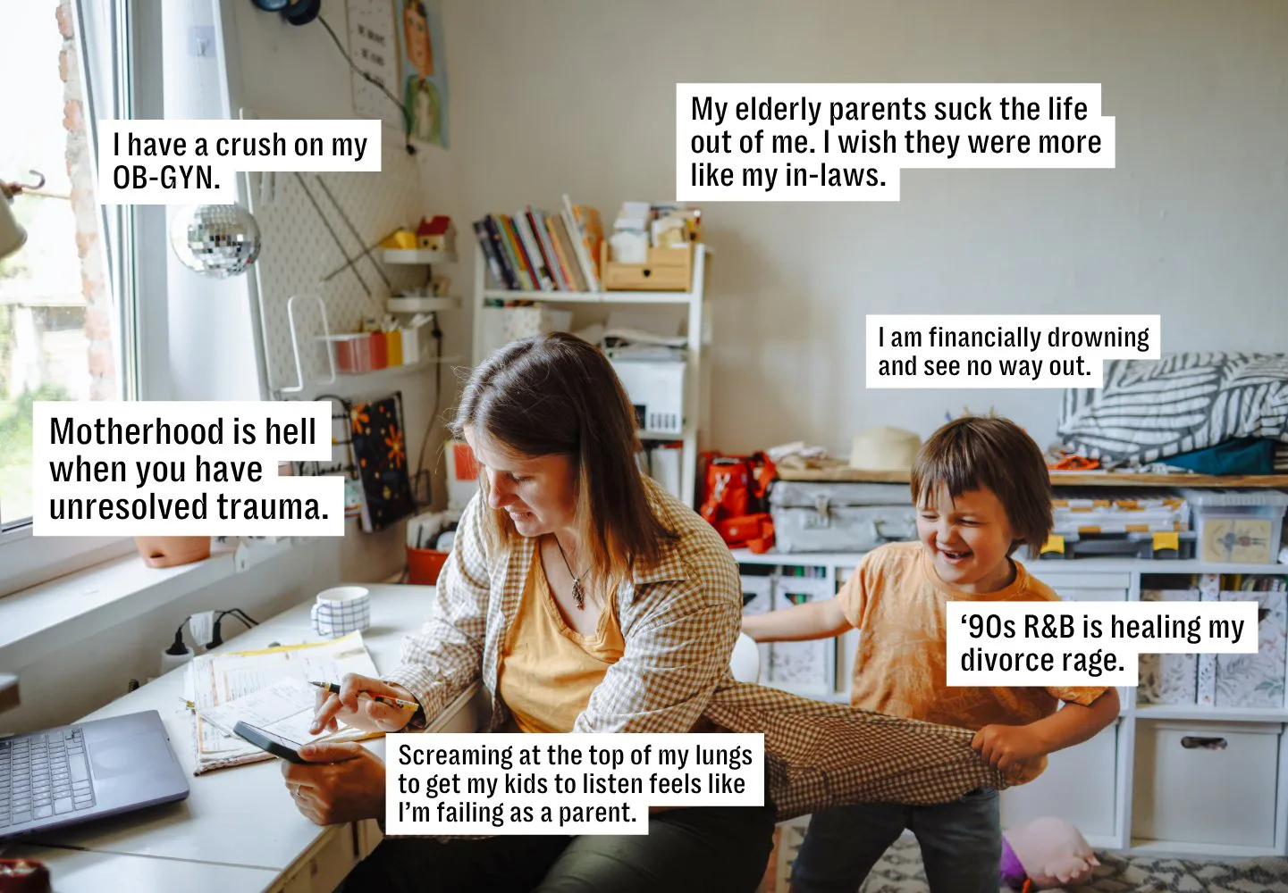 A woman tries to work at her desk while her kid pulls on her shirt.