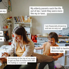A woman tries to work at her desk while her kid pulls on her shirt.
