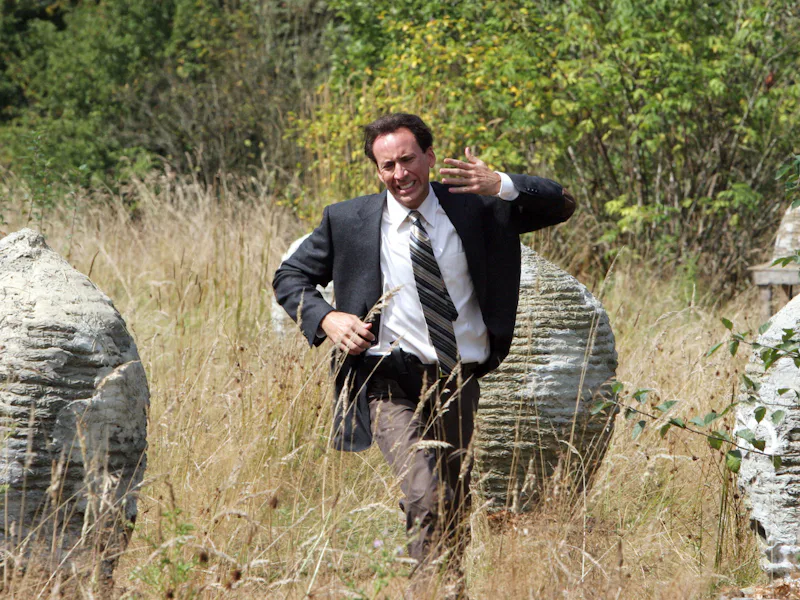 Nick Cage in 'The Wicker Man,' being bothered by some bees