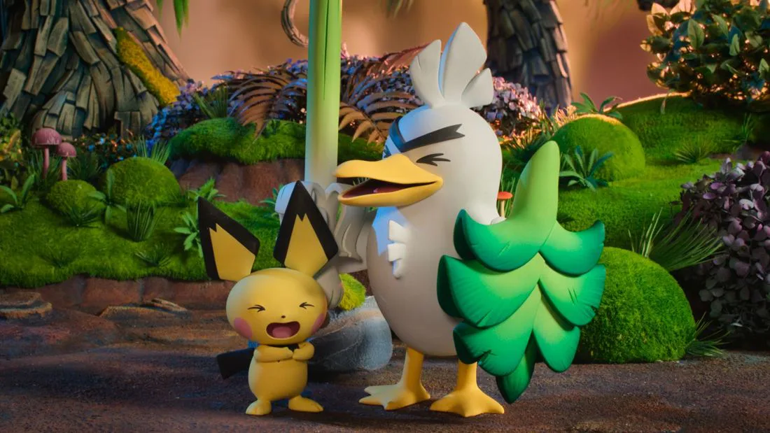 sirfetch'd and pichu laugh together in a forest setting in a still from the forthcoming show pokemon...