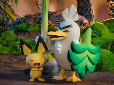 sirfetch'd and pichu laugh together in a forest setting in a still from the forthcoming show pokemon...