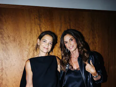 Katie Holmes and Cindy Crawford at the Net-A-Porter fashion week