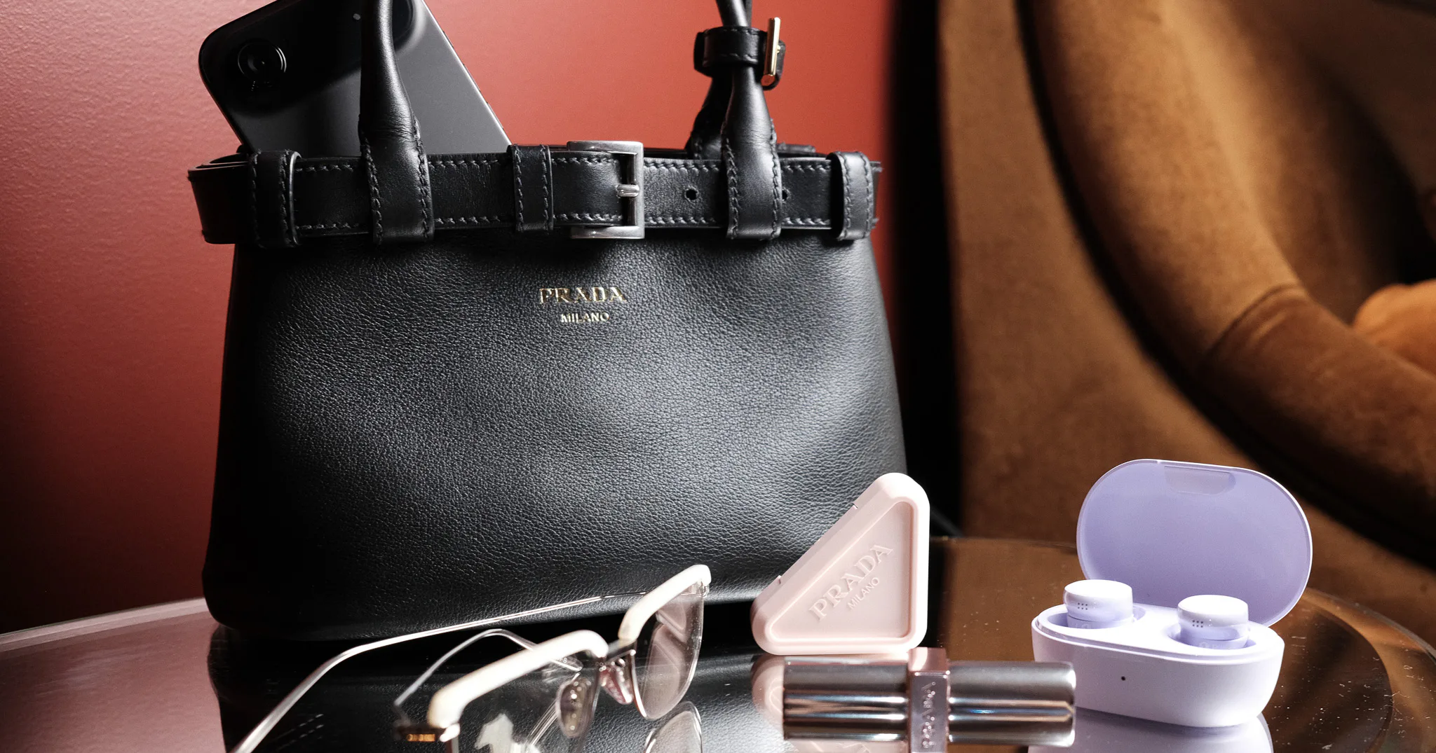 Why Prada’s Small Buckle Is The LBD Of Bags