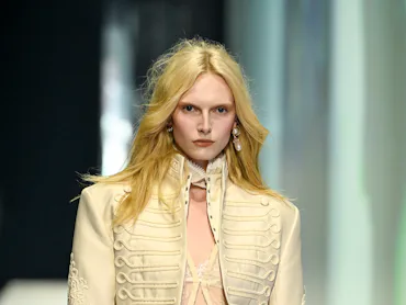 Alex Consani walks in H&M's Fall 2026 show.