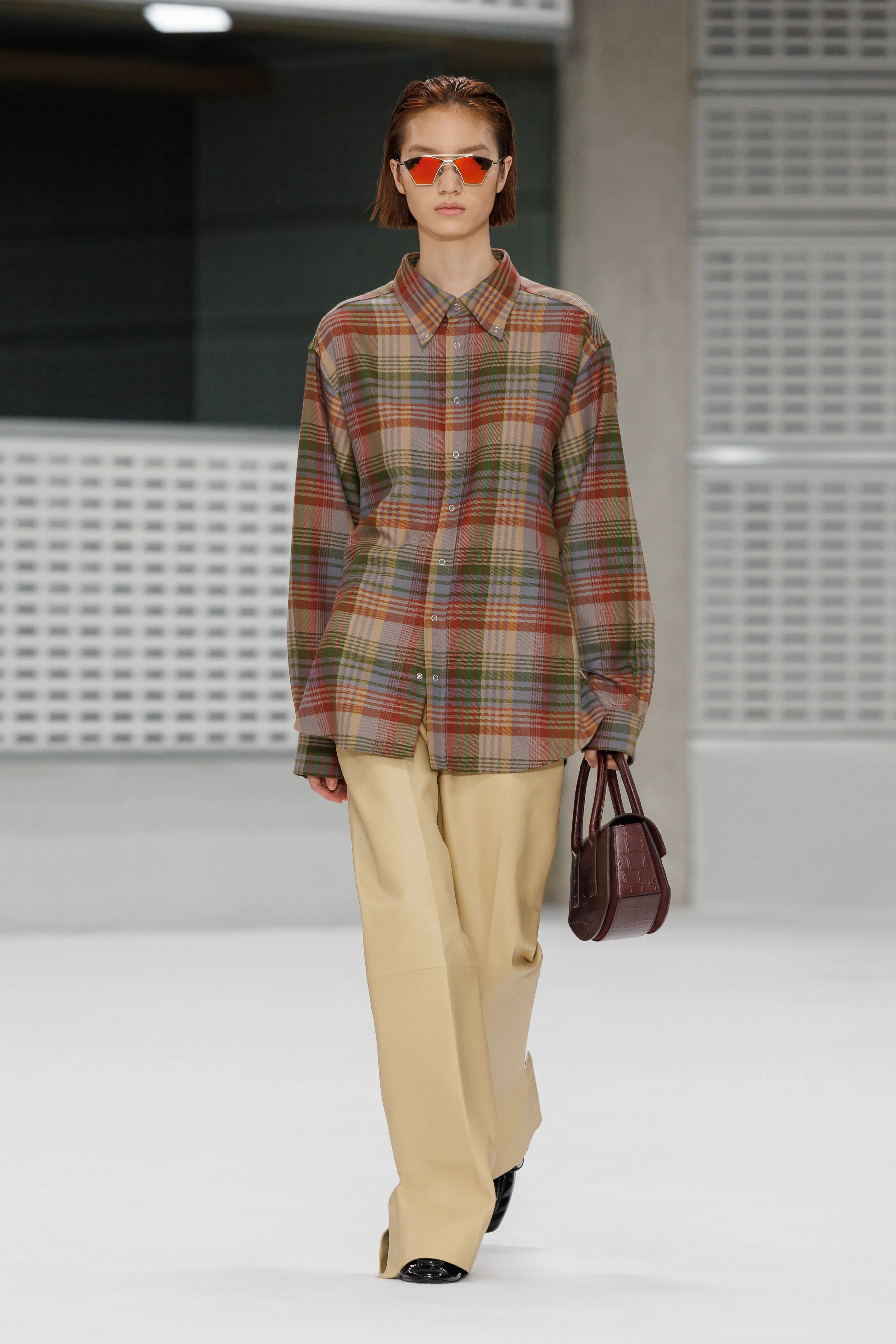 a look from mulberry designed by christopher kane shown at london fashion week spring 2027 runway sh...