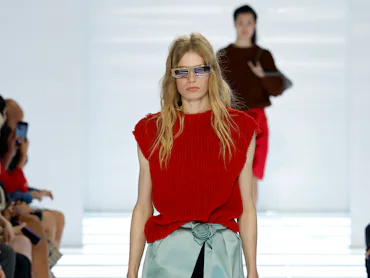 A model walks the runway at the Prada fashion show during the Milan Fashion Week - Womenswear Spring...