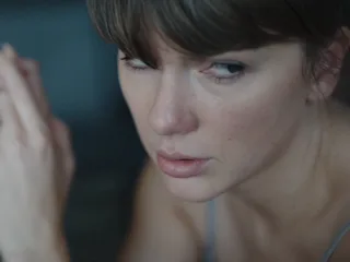 Taylor Swift's Emmys Easter eggs appear to have teased Dakota Johnson and Colin Farrell in her "Pati...