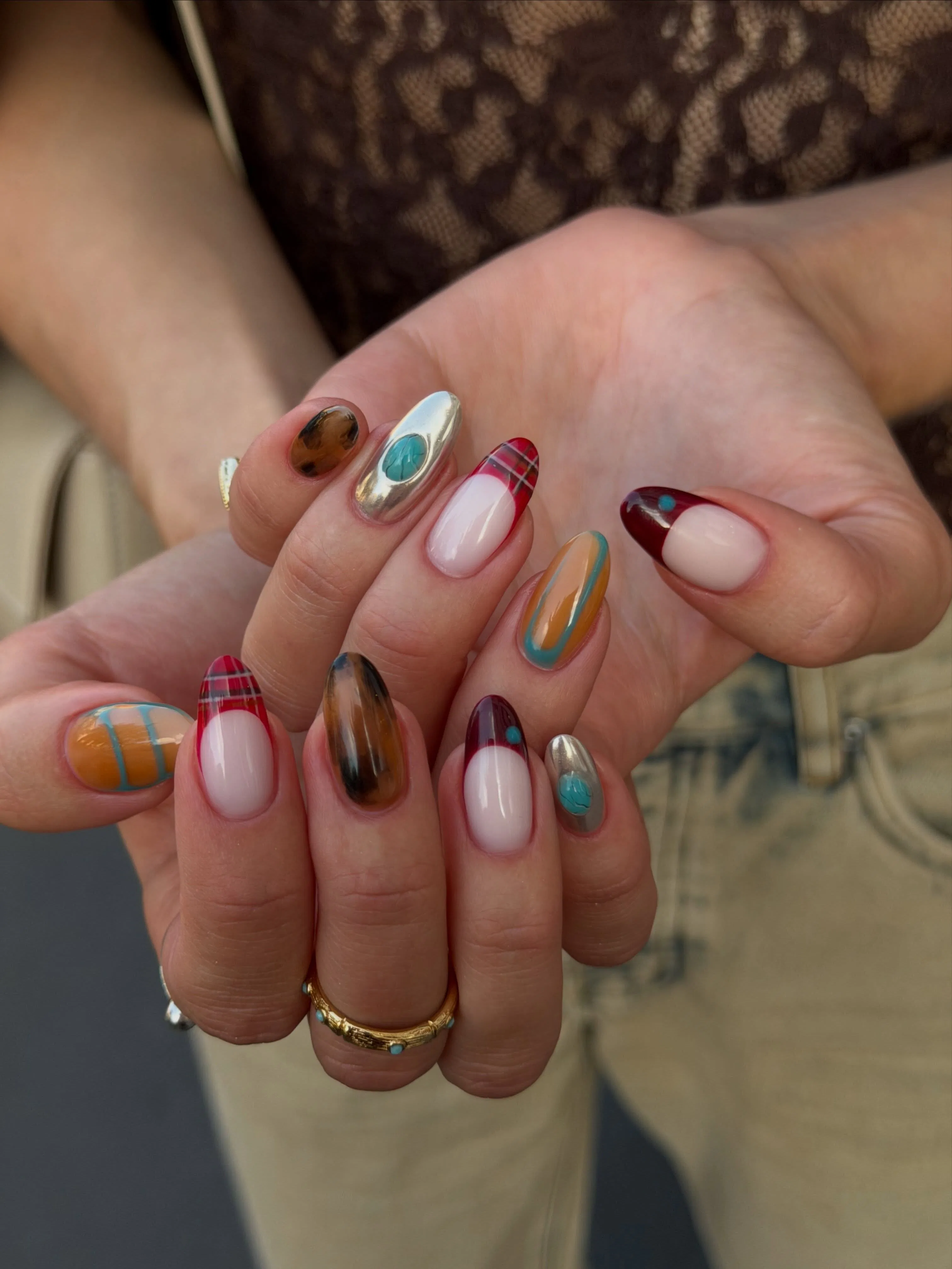 Fall 2026's top nail art trends, according to experts.