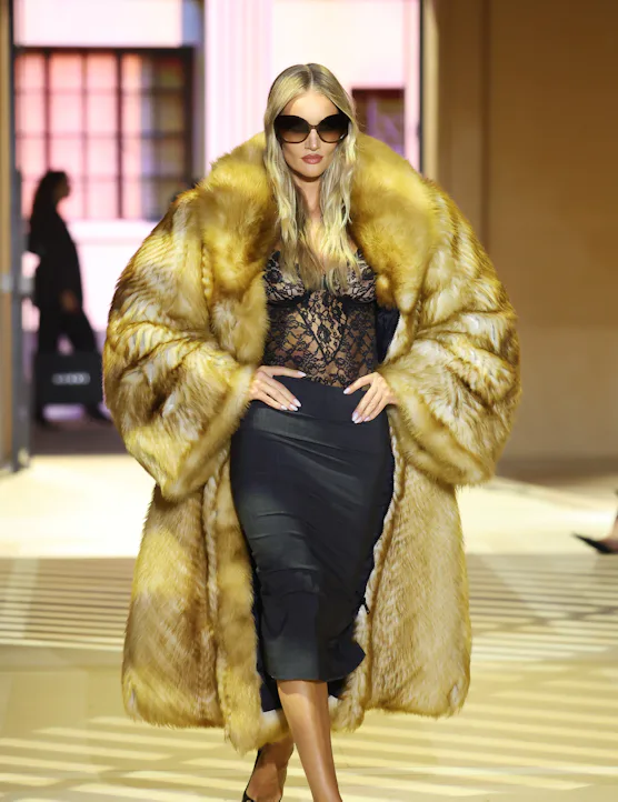 Rosie Huntington-Whiteley walks the runway at the Gucci The Store Show during the Milan Fashion Week...