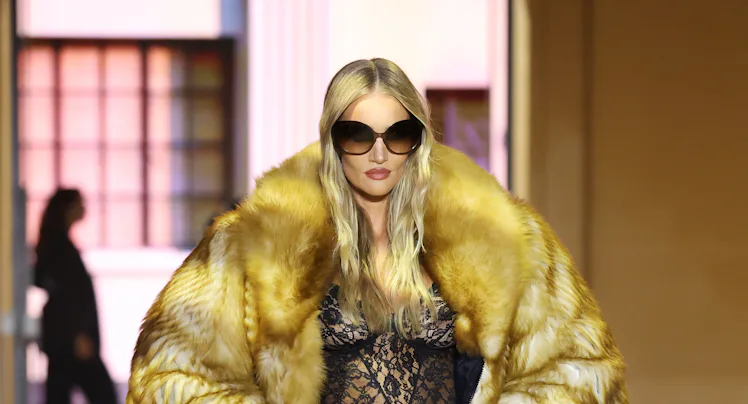 Rosie Huntington-Whiteley walks the runway at the Gucci The Store Show during the Milan Fashion Week...