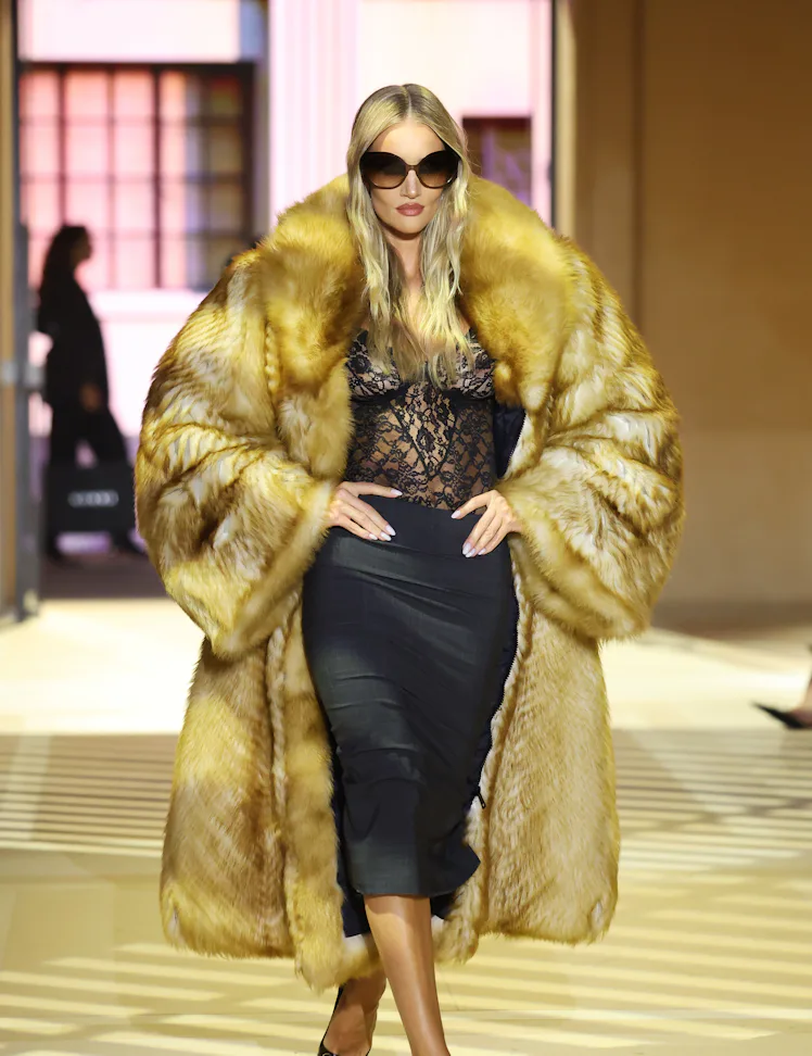 Rosie Huntington-Whiteley walks the runway at the Gucci The Store Show during the Milan Fashion Week...