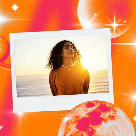 Young woman taking in the sunset after reading her October 2026 horoscope.